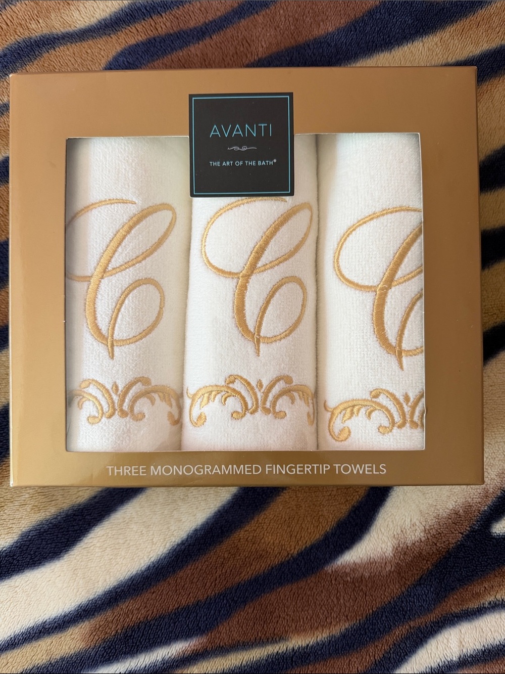 Avanti White Fingertip Towels with Gold Monogram Embroidery